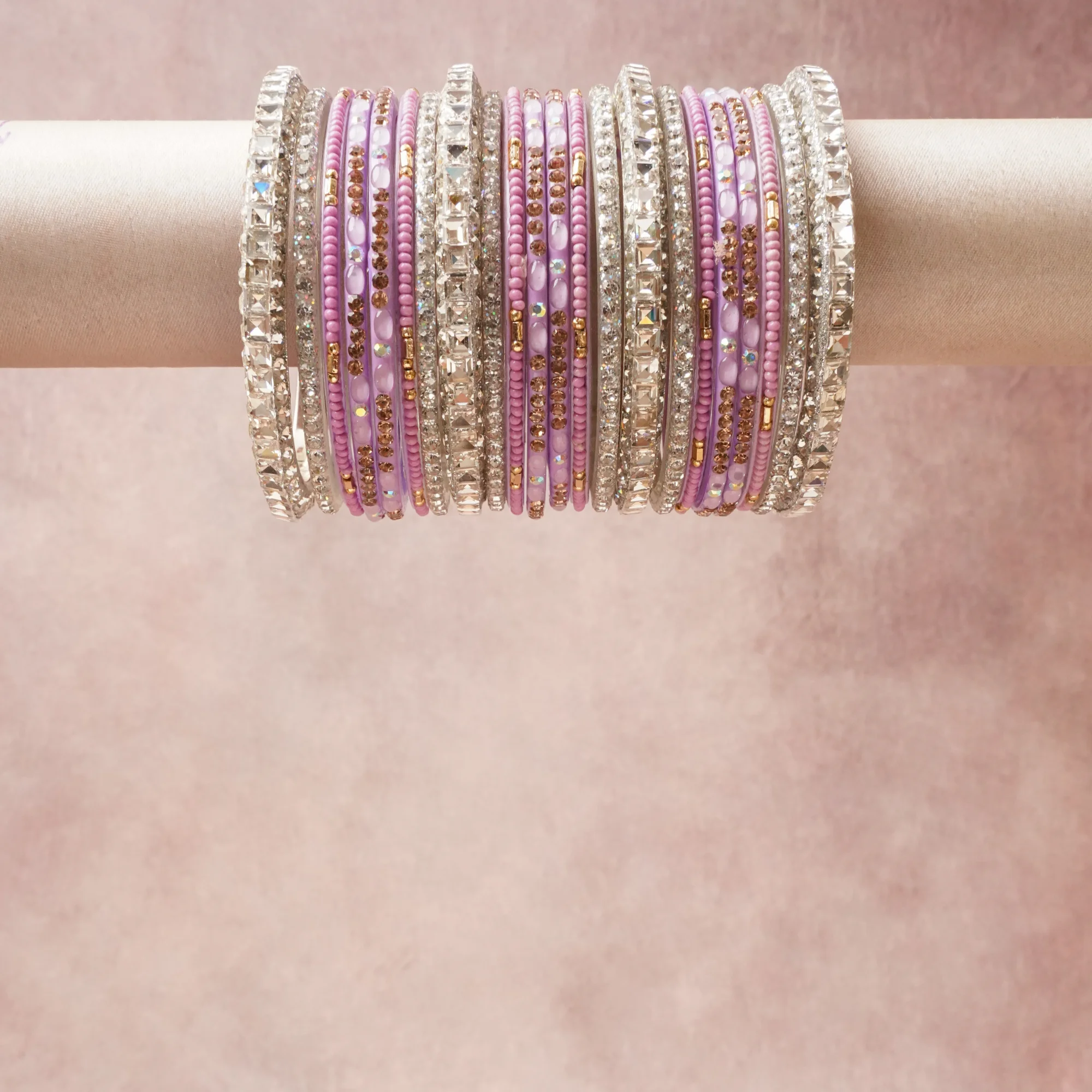 A grounding Lavender forms the heart of the set, while touches of Gold add charm.

A thoughtful composition of Silver-tone Metal, Rhinestones, Glass, Enamel, designed to feel complete without being heavy.
Each element layers seamlessly, creating a look that is refined, wearable and quietly striking.